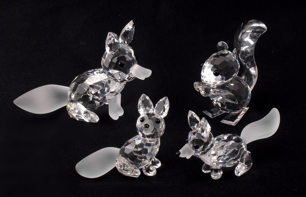 SWAROVSKI CRYSTAL FIGURINES FOX SQUIRREL FOX: SWAROVSKI CRYSTAL FIGURINES: To include, LARGE FOX 7629 070 000, frosted nose, Adi Stocker designer, issued 1987 retired 1988; MINI SITTING FOX 7677 045 000, Adi Stocker designer, issued 1988 retired 