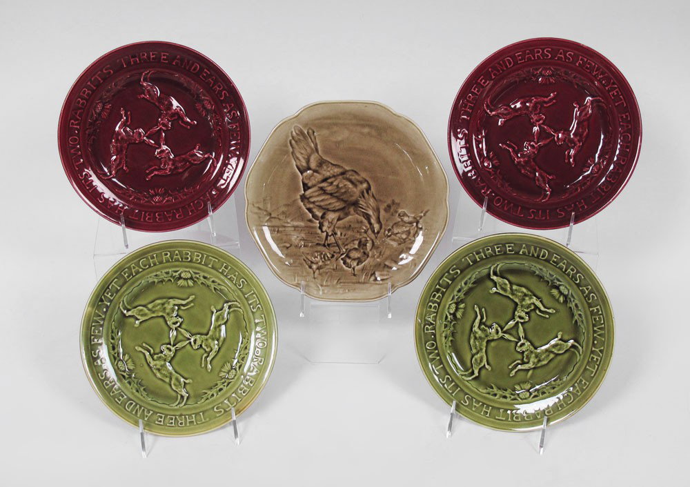 4 SARREGUEMINES MAJOLICA RABBIT PLATES: 4 SARREGUEMINES MAJOLICA RABBIT PLATES: Relief figures of rabbits, thistle and motto "Rabbits Three and Ears as Few, Yet Each Rabbit Has It's Two". Impressed Sarreguemines mark with numbers, stamped "