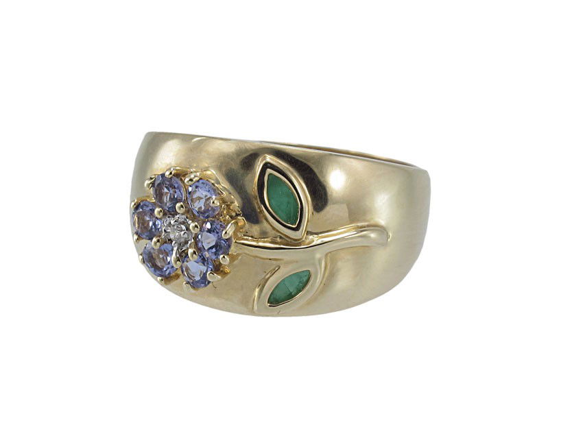 TANZANITE, DIAMOND & EMERALD FLOWER RING 5.4 GR: TANZANITE, DIAMOND AND EMERALD FLOWER RING: 14K yellow gold ring contains one round full cut diamond. Weight: .015 Ct. six round tanzanite and two marquise emeralds. Weight: .25 Ct. Approx. The diamon