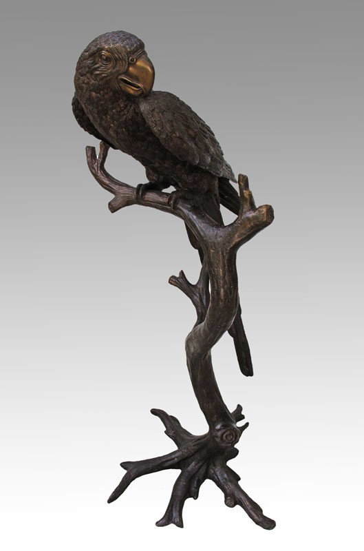 5 FT TALL BRONZE PARROT SIGNED PHILLIPS: LARGE BRONZE PARROT SIGNED PHILLIPS: Sitting on a tree branch, approx. 5 feet tall.