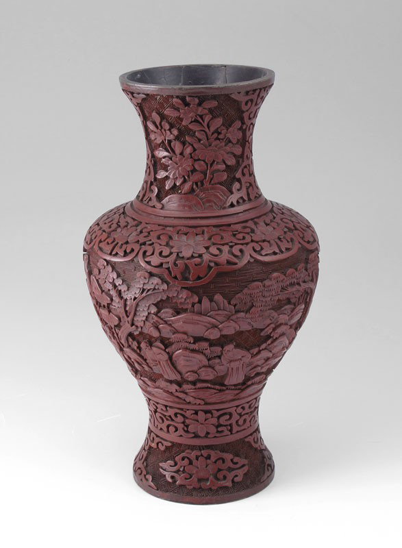 CHINESE CINNABAR VASE: CHINESE CINNABAR VASE: Carved in image of village with figures, 10 1/2".