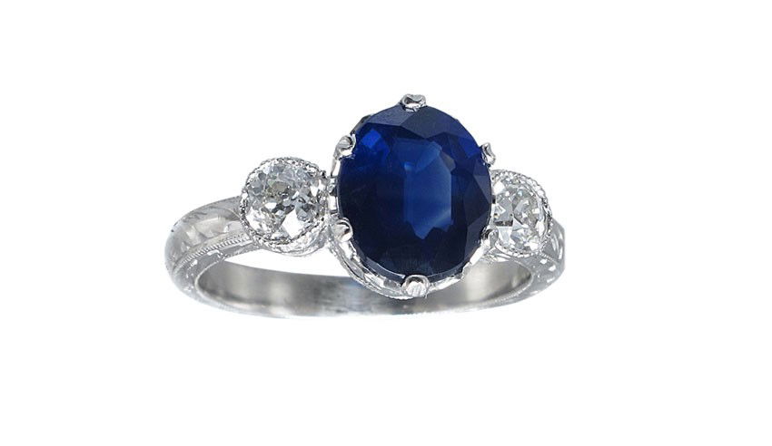 PLATINUM 2.27 CT SAPPHIRE & DIAMOND RING SZ 6: PLATINUM SAPPHIRE AND DIAMOND RING: Platinum ring centers a 2.27 Ct single sapphire, oval mixed cut, VSI clarity, B hue, 6 tone and 4 in saturation. This beautiful stone is flanked by 2 Old European r