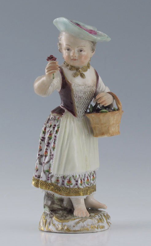 MEISSEN PORCELAIN BAREFOOT LADY: MEISSEN PORCELAIN BAREFOOT LADY: Finely detailed figurine of a woman in sun hat and passing a rose from her basket. Minor loss of lace on her bodice. Blue cross swords mark, illegible impressed marks.