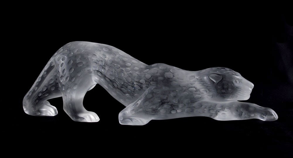 LALIQUE FRENCH CRYSTAL LEOPARD: LALIQUE FRENCH CRYSTAL LEOPARD: 15"l. X 4 1/4" tall. Frosted crystal with textured spots. Signed in script.