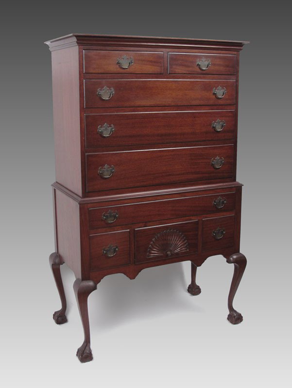 MAHOGANY FLAT TOP HIGHBOY CHEST ON CHEST: MAHOGANY FLAT TOP HIGHBOY CHEST ON CHEST: 2 part chest with overhanging molded top. Upper section with 5 drawers. The lower section of 4 drawers with the center drawer having shell carving. Four cabri