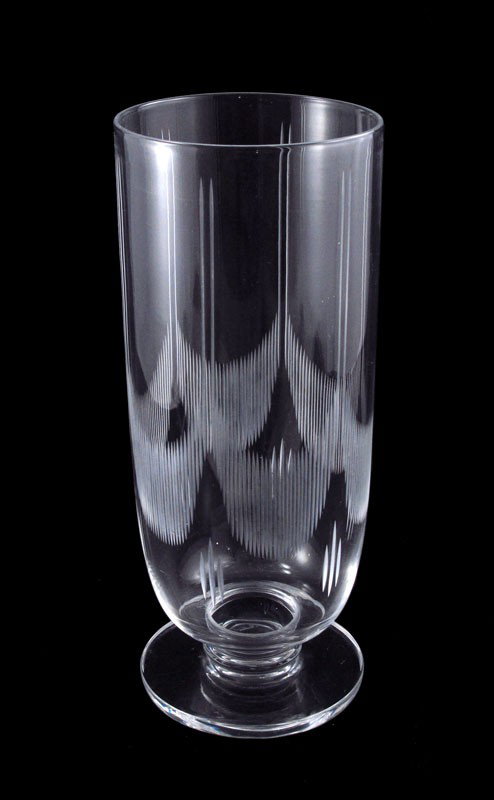WALTER DORWIN TEAGUE FOR STEUBEN GLASS VASE: WALTER DORWIN TEAGUE FOR STEUBEN GLASS VASE: Designed by Walter Dorwin Teague, American industrial designer, for Steuben with cut geometric design. Signed Steuben on base. 11 3/8'' h. x 4 7/8''.