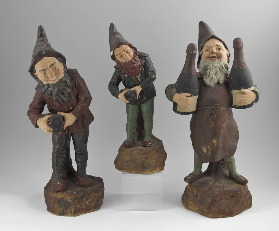 3 JOHANN MARESCH TERRA COTTA GNOMES: MARESCH, Johann, (Czech, 19th Century): 3 Bearded Gnomes to include; Gnome with 2 wine bottles, 14 1/2" h., incised Ergo Bibamus; large gnome with box in hands 14 1/2" h., small gnome with box in hand
