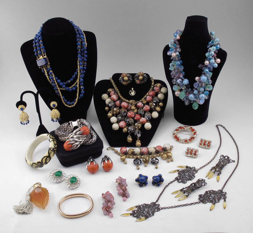 VINTAGE COSTUME JEWELRY Kramer Hattie Carnegie Ven: LOT OF VINTAGE ESTATE COSTUME JEWELRY: To include, HOBE' ensemble of necklace, bracelet and clip earrings; HATTIE CARNEGIE ''Lapis'' bead necklace and clip earrings; KRAMER bright orange circle pin an
