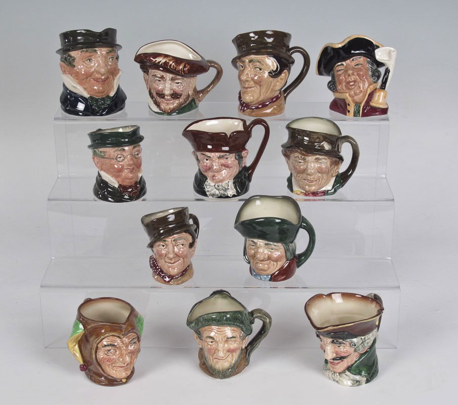 12 ROYAL DOULTON SMALL CHARACTER JUGS: 12 ROYAL DOULTON SMALL CHARACTER JUGS: To include, Dick Turpin, Sam Weller 4'', Town Crier, Drake, Jester, Toby Philpots, Capt. Cuttle, Mr. Pickwick, Paddy, Auld Mack, Sam Weller 3'', Old Charlie.