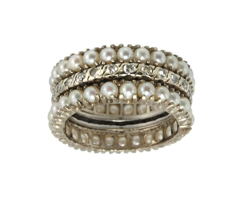 3 STACKING BAND RINGS PEARL & DIAMONDS 6.2 GR SZ 7: THREE 14K PEARL AND DIAMOND BANDS: Three 14K white gold bands. Two are bands of 3.00 mm seed pearls. The third ring has 27 round brilliant cut diamonds. Weight: .70 Ct. Approx. Rated VS in clarity and