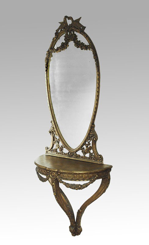 ITALIAN GILT CONSOLE TABLE AND MIRROR: ITALIAN GILT CONSOLE TABLE AND MIRROR: Two part decorative table and mirror, 34 3/4"h. x 36"w. x 16"d. wall mount demi table under oval mirror surmounted by love birds. Overall height approx. 7'8".