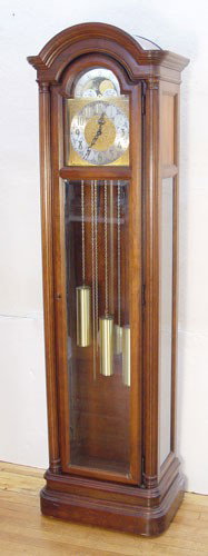 HOWARD MILLER MOONPHASE GRANDFATHER CLOCK : HOWARD MILLER MOONPHASE GRANDFATHER CLOCK: Weight driven movement. Marked Howard Miller Western Germany on face. Model number 610152. 81" high x 21 1/2" wide x 14" deep.