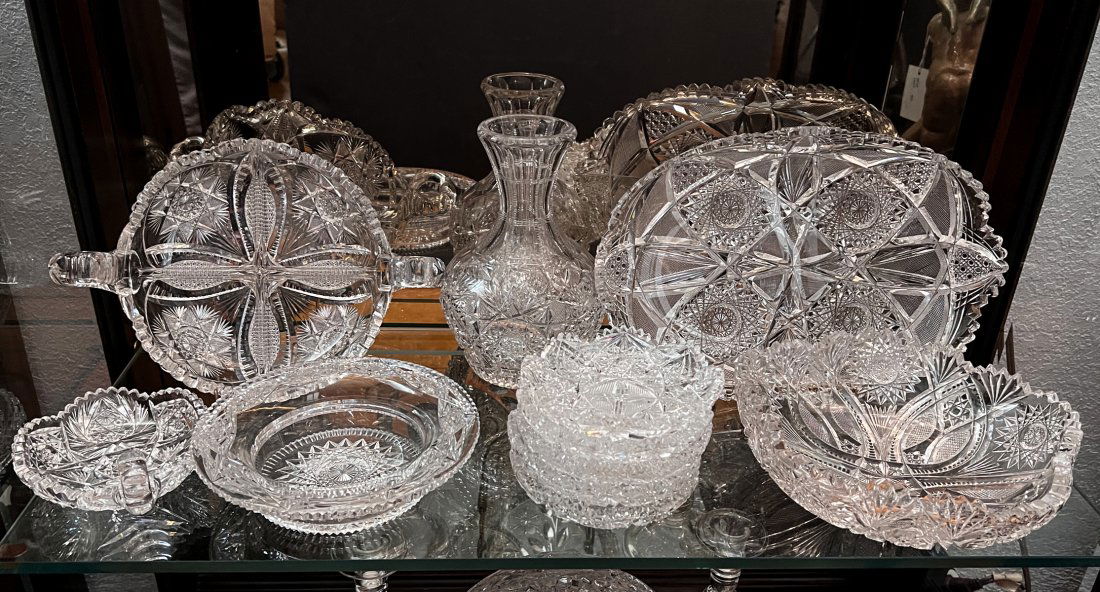 11 PC. CUT CRYSTAL & GLASS COLLECTION: 11 PC. CUT CRYSTAL & GLASS COLLECTION: Comprising; 1- Decanter, 1- Wine bottle coaster, 1- Handled dish, 5- Trinket dishes, 1- Fruit bowl, 1- Handled divided dish, 1- Oval serving platter. Largest App