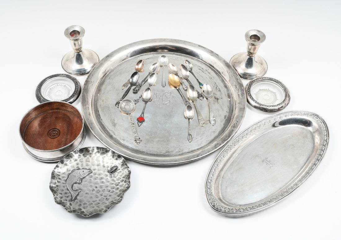 21 PC. STERLING & SILVER PLATE COLLECTION: 21 PC. STERLING & SILVER PLATE COLLECTION: Approx. 36.21 Troy ounces weighable. Comprising; 2- Silver mounted Coasters, 1- Silver plated Wine bottle coaster, 14- Souvenir spoons, 2- Weighted Sterling