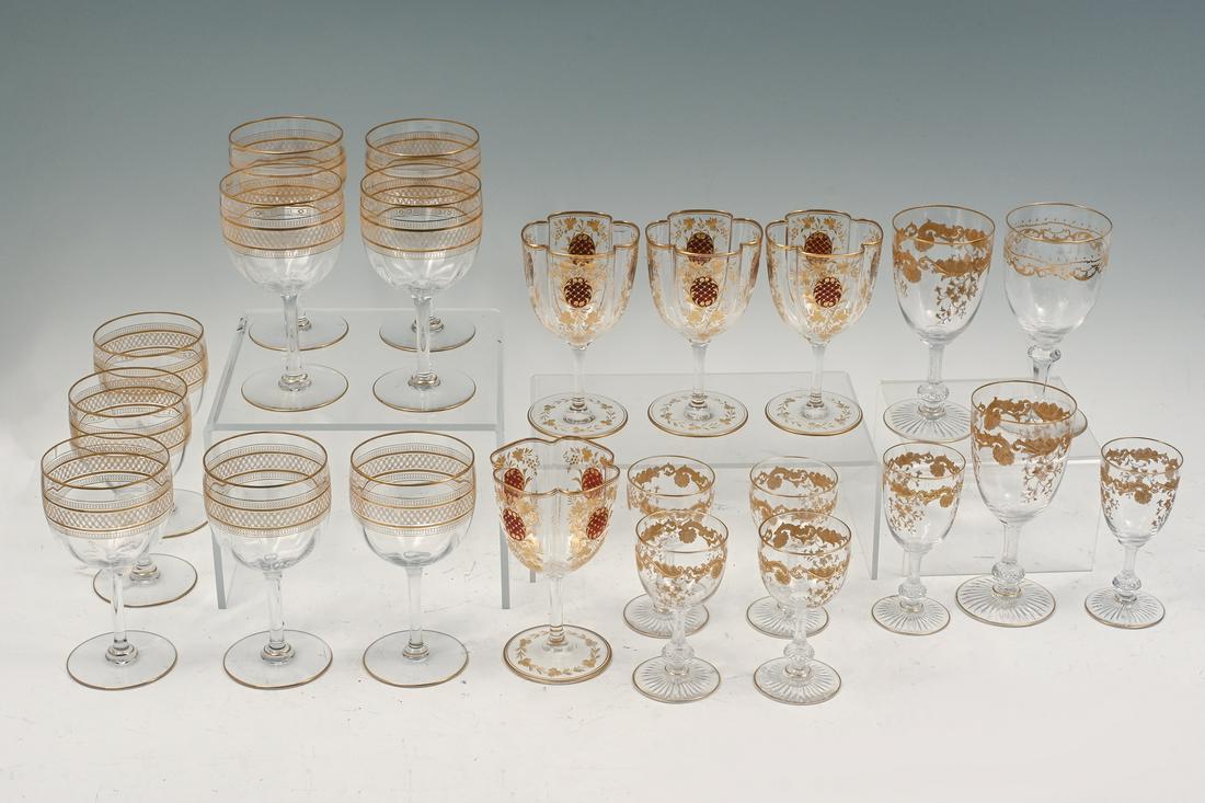 22 PC. GILT EMBOSSED STEMWARE: 22 PC. GILT EMBOSSED STEMWARE: A collection of 21 finely etched & Gold Embossed Wine glasses & Cordials. Various patterns & shapes. Largest 6.5" h x 3" dia.