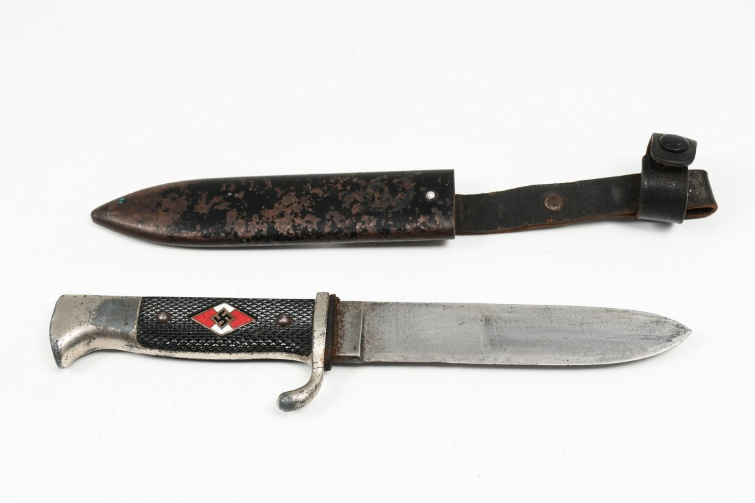 GERMAN NAZI KNIFE WITH SHEATH: GERMAN NAZI KNIFE WITH SHEATH: Blade marked "Tiger Solingen RZM7-68", enameled swastika on the handle, painted sheath, overall length 10".