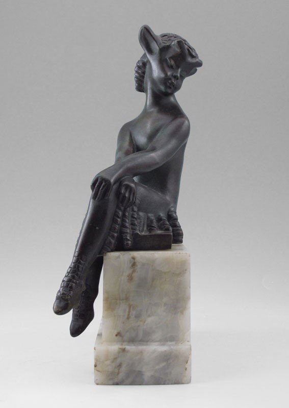 YOUNG SATYR BRONZE SIGNED MONGINOT: PATINATED BRONZE SHY YOUNG SATYR SIGNED CH. MONGINOT: Seated figure rests on a white marble plinth, bronze is 9'', with plinth 10 1/2'', some minor wear to base.