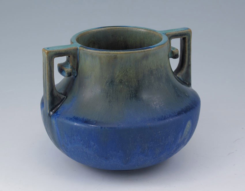 FULPER ART POTTERY DOUBLE HANDLED VASE: FULPER ART POTTERY DOUBLE HANDLED VASE: With green blue glaze, stamped Fulper on base. 4 3/4" h. x 5 3/4" dia.