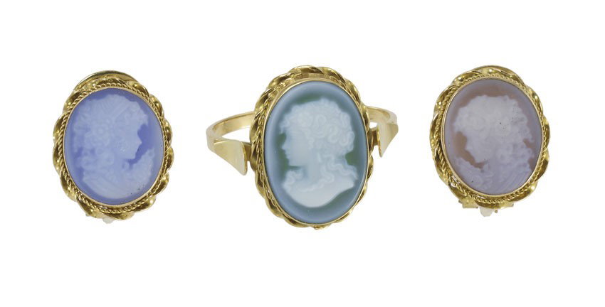 18K GOLD BLUE CALCEDONY CAMEO RING & EARRINGS: 18K GOLD AND CAMEO RING AND EARRING SET: 18K yellow gold ring and earring set contain blue, violet and green chalcedony cameos. Weight: 7.6 grams. Ring size: 8.5 Post and hinged clip closures.