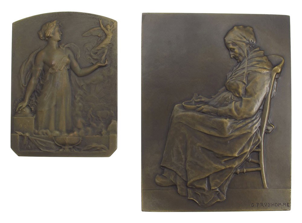 2 PC MEDAL LOT LAMOURDEDIEU, PRUD'HOMME: 2 Piece Large Bronze Plaque Lot to include 1) LAMOURDEDIEU, Raoul, (French, 1877-1963): Depicts a scantily clad woman holding a winged statue, scene verso of two children, signed, marked 'Bronze', 2 3