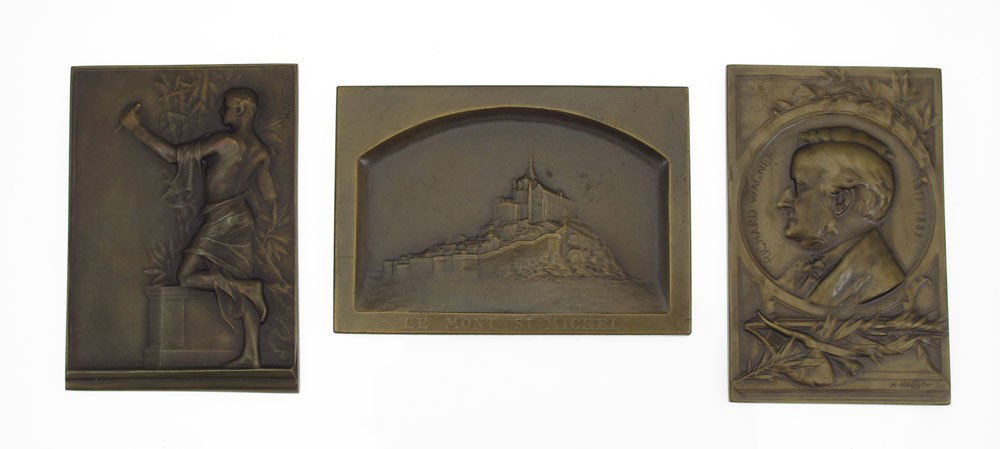3 PC MEDAL LOT KAUTSCH, PICAUD: 3 Piece Bronze Plaque Lot to include 2 bronzes by Heinrich Kautsch, (Czechoslovakia, born 1859), 1) Portrait Plaque of Richard Wagner, 2 3/4'' x 1 3/4''; 2) Depicts a robed young man with chisel, 2 5/
