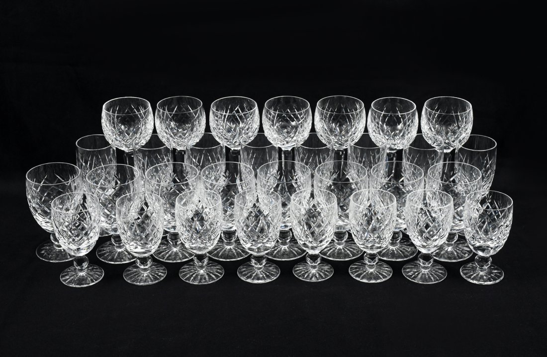 31-PC WATERFORD DONEGAL COLLECTION: 31-PC WATERFORD DONEGAL COLLECTION: Comprising: 7- Hock wine glasses; 8- Fluted champagne glasses, 8- Water Goblets, 8- Claret wine glasses. Tallest is approx. 7.5" h.