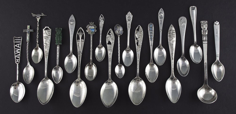 COLLECTION OF STERLING SILVER TOURIST SPOONS: COLLECTION OF STERLING SILVER TOURIST SPOONS: 19 spoons to include Honolulu, Carmel by the sea, CA, Las Vegas, Grand Canyon, Seattle World's Fair '62, Texas, Santa Cruz, California, Road Runner Inca h