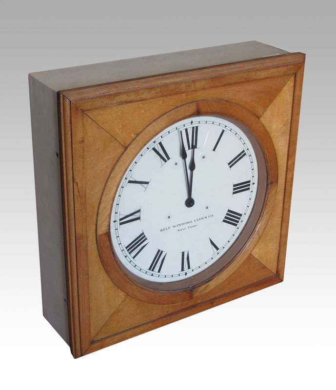 SELF WINDING CLOCK CO. WALL CLOCK: SELF WINDING CLOCK CO. WALL CLOCK: Square case with painted metal dial. Battery operated electric movement. 21" square x 6 3/4" deep.