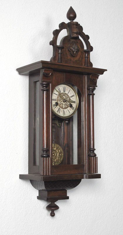 HAMBURG AMERICAN SMALL REGULATOR WALL CLOCK: HAMBURG AMERICAN SMALL REGULATOR WALL CLOCK: Carved removable pediment with applied decoration, carved half columns on case, fish scale carved lower section. Hamburg American crossed swords marked tim