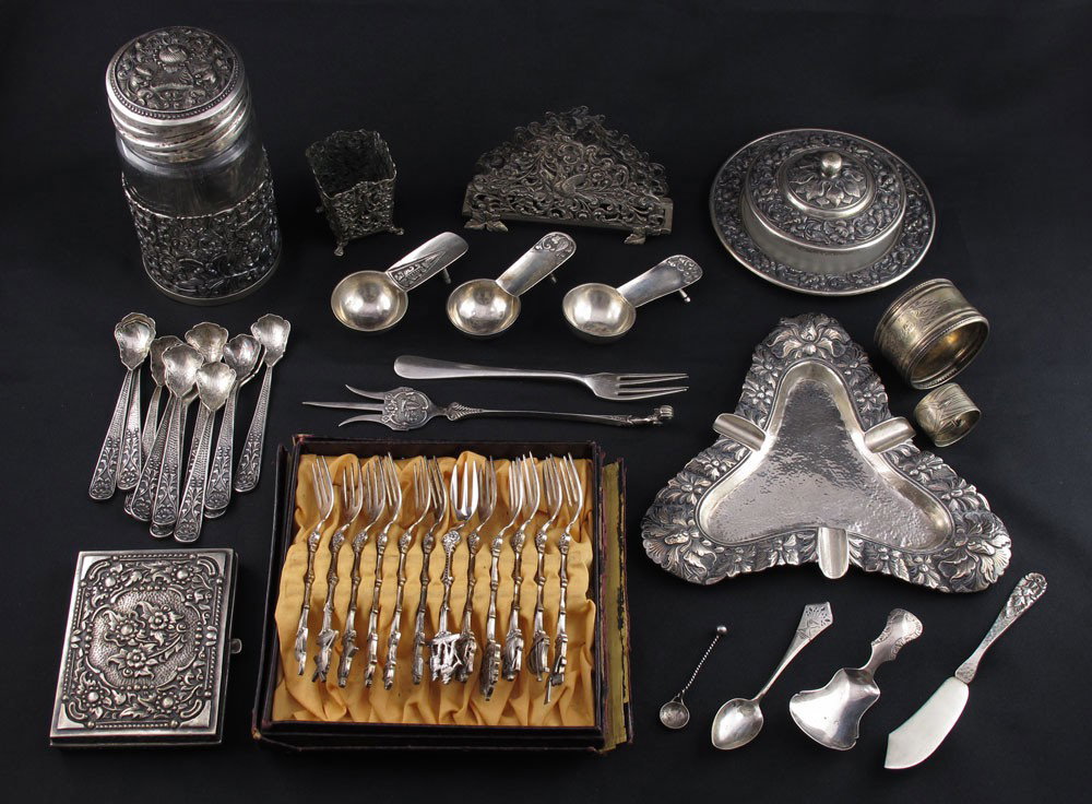 COLLECTION OF CONTINENTAL SILVER ITEMS: COLLECTION OF CONTINENTAL SILVER ITEMS: To include Dutch repousse ashtray, Dutch letter holder with bird and foliate scroll decoration, Dutch toothpick holder (missing insert), 4 Dutch spoons and fork
