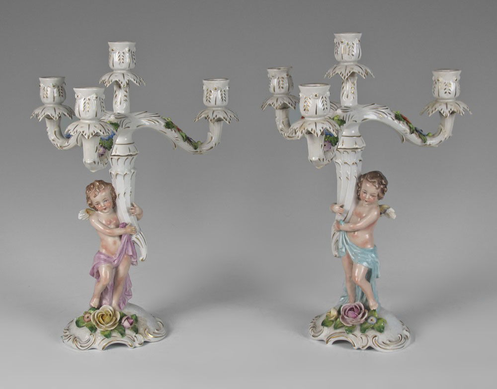 GERMAN DRESDEN PORCELAIN CHERUBIC CANDELABRA: GERMAN DRESDEN PORCELAIN CANDELABRA: Cherub figural stem supports 4 lights, 15 3/4" tall. Crown N mark along with Germany.