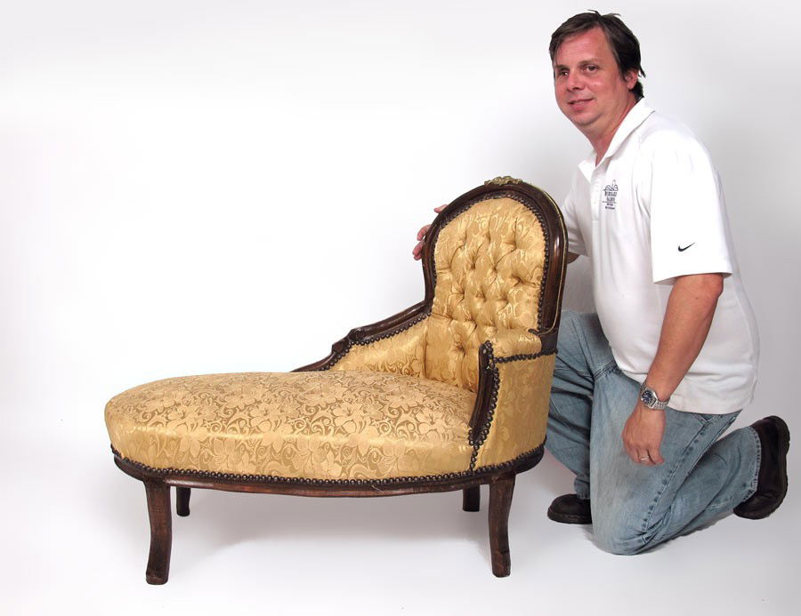 CHILDS SIZE VICTORIAN CHAISE LOUNGE CHAIR: CHILDS SIZE VICTORIAN STYLE CHAISE LOUNGE CHAIR: Shaped rails and arms with ormolu decoration on top rail. Yellow floral upholstery with tufted back. 33 1/4" h. x 39 1/2" x 19 1/4".