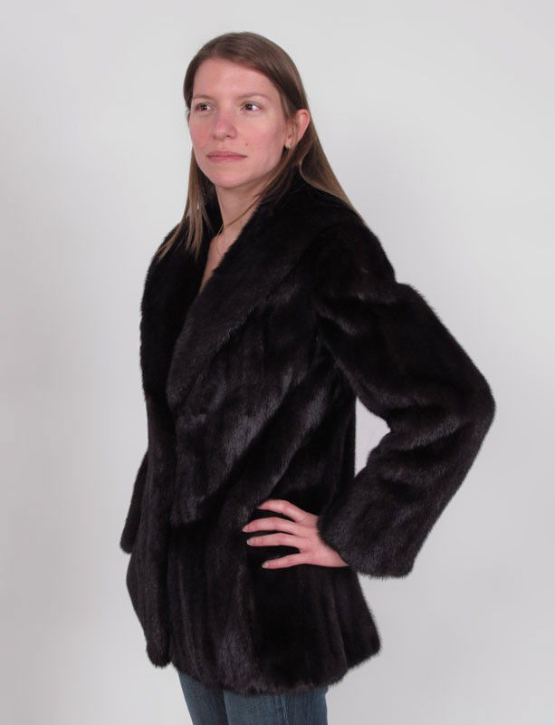 NEIMAN MARCUS BLACK MINK JACKET: BLACK - DARKEST BROWN MINK JACKET: Size 6-8, generous collar and slit pockets, length approx. 30". Neiman Marcus label.