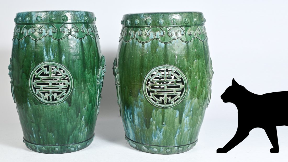 TWO LARGE CHINESE TERRACOTTA GARDEN SEATS: TWO LARGE CHINESE TERRACOTTA GARDEN SEATS: Stunning pair of massive, drum-shaped garden stools with green & teal glaze. Each side has a large bat cutout alternating with a Chinese Shou longevity symbo