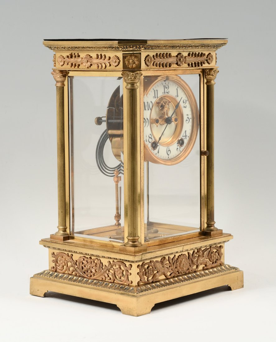 ANSONIA CRYSTAL REGULATOR CLOCK: ANSONIA CRYSTAL REGULATOR CLOCK: Manufactured by the Ansonia Clock Co. New York. In ornate brass & glass case with front and back doors. Having a two-vial mercury pendulum and spider winding key. Appr