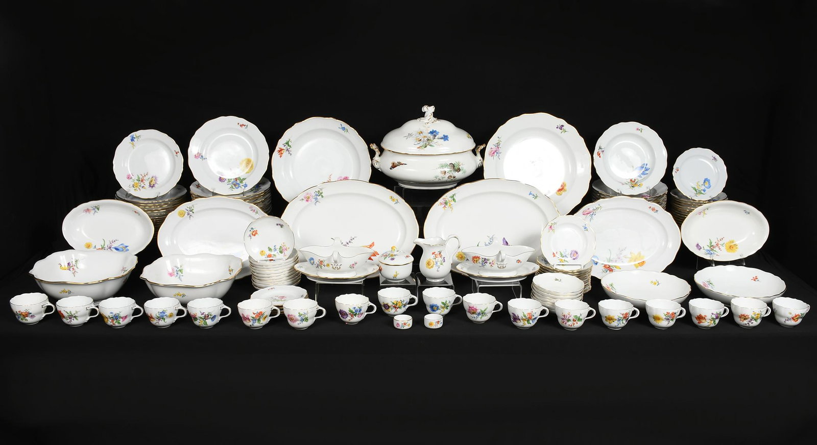 135 PC. 19TH-C. MEISSEN GOLD & FLORAL DINNERWARE: 135 PC. 19TH-C. MEISSEN GOLD & FLORAL DINNERWARE: Late 19th-century, marked with underglaze blue pommel crossed swords, hand-painted with a varied floral pattern. Comprising; 16- Dinner plates, 16- Lu