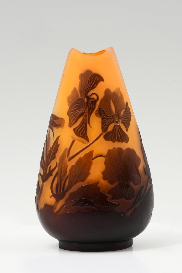 FRENCH GALLE CAMEO ART GLASS VASE: FRENCH GALLE CAMEO ART GLASS VASE: Art Nouveau cameo glass vase w/ a mark that reads "Galle". Brown floral etching on orange base. Raised "Pi" signature at back. Approx. 5" h x 3.25" w x 2.5" d.