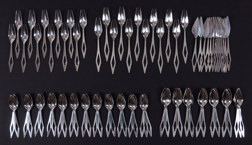 GIO PONTI FRASER'S STAINLESS STEEL FLATWARE SET: GIO PONTI FRASER'S STAINLESS STEEL FLATWARE SET: Designed by Gio Ponti, marked Fraser's Domus to 77 pieces to include 12 forks 8 1/2'', 12 salad forks 7 5/8, 25 teaspoons 6 3/4'', 15 soup spoons 7 5/8