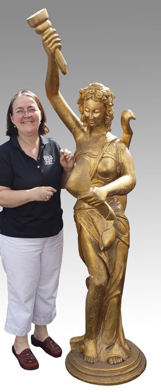LIFE SIZE CARVED GILT WOOD STATUE OF GREEK MUSE: LIFE SIZE CARVED GILT WOOD STATUE OF GREEK MUSE: Figural maiden holding torch and scroll with lyre on back. Measures approx. 79'' h. x 21'' x 31''