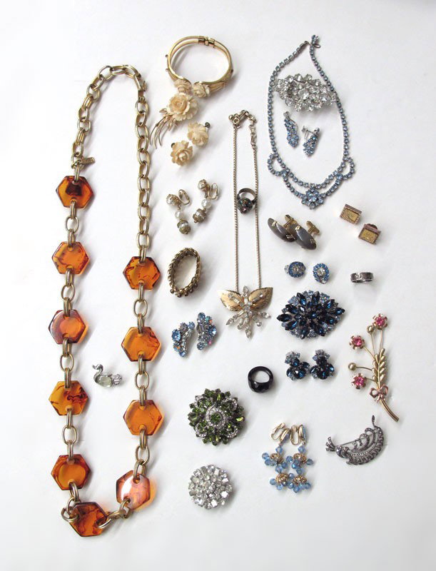 LOT VINTAGE COSTUME JEWELRY SIGNED: TRAY LOT VINTAGE COSTUME JEWELRY: To include, Weiss rhinestone brooches and blue clip earrings; Yves Saint Laurent root beer bakelite? / tortoise lucite & golden link belt, 38"; Van Dell gold filled a
