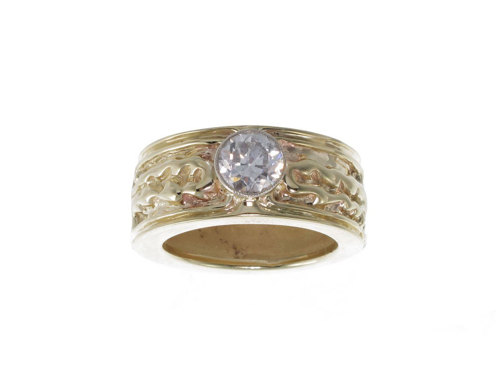1.05 CT DIAMOND SOLITAIRE 14k GOLD BAND RING 15.1: 1.05 CT DIAMOND SOLITAIRE WIDE GOLD BAND: 14K yellow gold band centers an approx. 1.05 Ct old European round cut diamond, rated SI2 in clarity and G color. Bezel set. Size 6. Weight 15.1 grams. Sold w