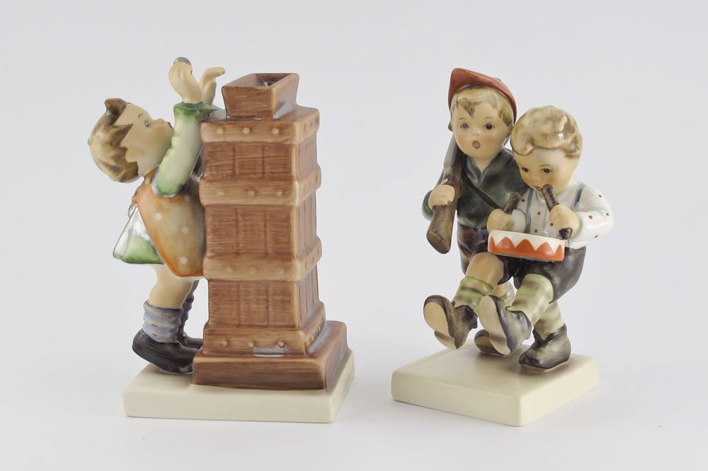 HUMMEL PORCELAIN FIGURINES VOLUNTEER'S & BANK: 2 HUMMEL PORCELAIN FIGURINES: 1) VOLUNTEER'S #50/20/0-170, Desert Shield August 1990 / Desert Storm February 1991 stamp, signed "Master Painter Christine Endes? 10-31-92", mark VI, 5"h.; 2) LITTLE THR