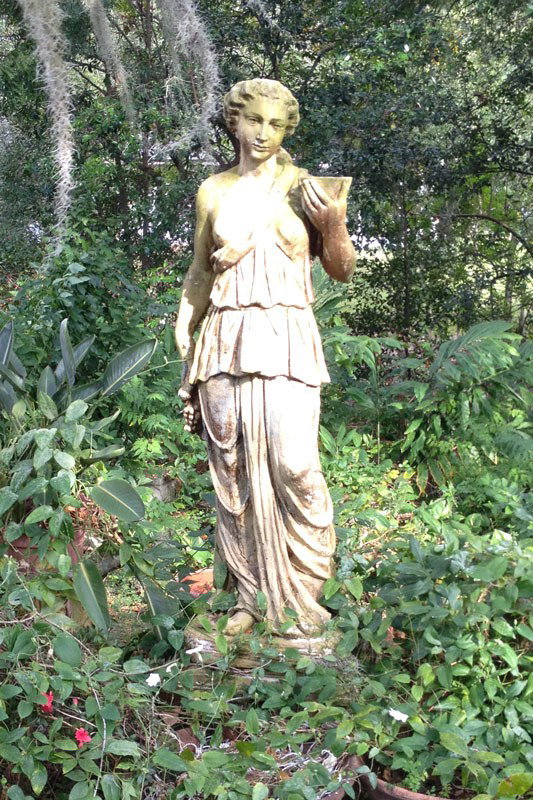 LARGE CONCRETE STATUE OF CERES: LARGE CONCRETE STATUE OF CERES: Figure of Ceres, goddess of the harvest, holding a sheath of wheat. 59 1/4" h. x 22" x 16". Sold with base 16 3/4" h. x 12 3/4" x 16 3/4".