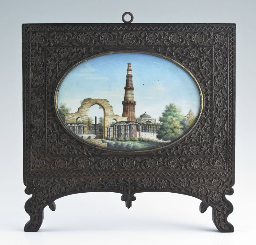 MINIATURE PAINTING ON IVORY INDIAN MOSQUE: HIGHLY DETAILED INDIAN MINIATURE PAINTING ON IVORY: Depicts Architectural Ruins, Figures, Mosque, and Tower, sight size 3 5/8" x 5 3/4" oval, encased in highly carved hardwood frame in foliate and C S