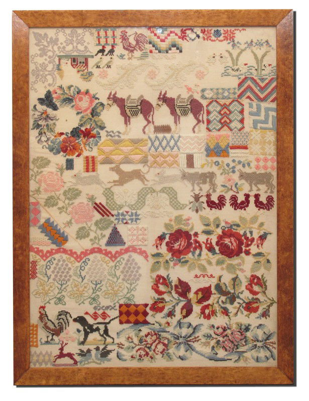 19th C HAND STITCHED SAMPLER BIRDS EYE FRAME: 19th C HAND STITCHED SAMPLER: Worked in bright colors in a most interesting group of roosters, birds, donkeys, insects, dogs, flowers, a wreath, geometric shapes, and a curious upside down house. Fram