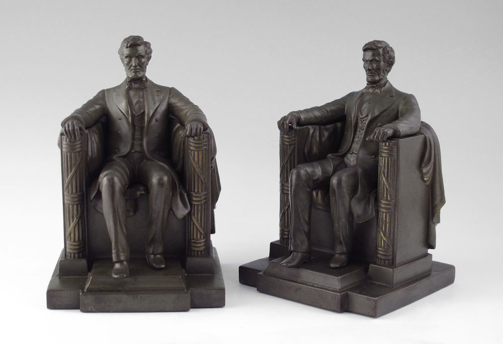 PAIR JENNING BROTHERS LINCOLN BOOKENDS: PAIR JENNING BROTHERS LINCOLN BOOKENDS: Patinated metal bookends after D. C. French's Lincoln Memorial. Marked 2440. Felt bottom. 7'' h. x 4 3/4'' x 4 1/2''.