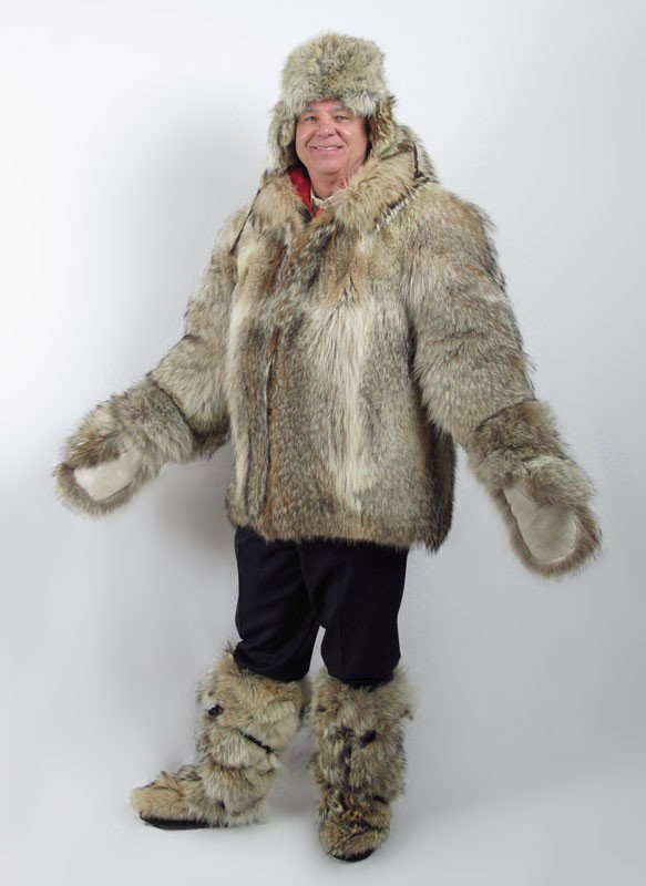 WOLF FUR PARKA, MUKLUKS, MITTENS, AND HAT: WOLF FUR PARKA, MUKLUKS, MITTENS, AND HAT: The parka hood is rimmed in excellent guard hairs. Red quilted interior, heavy metal zipper.