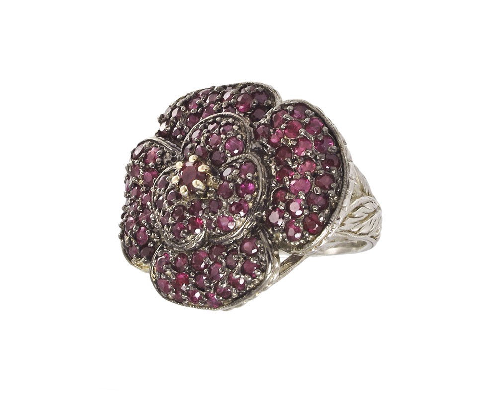 RUBY FLOWER RING 3 CTW 14K GOLD: BURMA RUBY FLOWER RING: Sterling silver and 14K yellow gold ring by Generations 1912, featuring one round cut ruby prong set in 14k yellow gold. Solid sterling silver ring contains 94 additional round