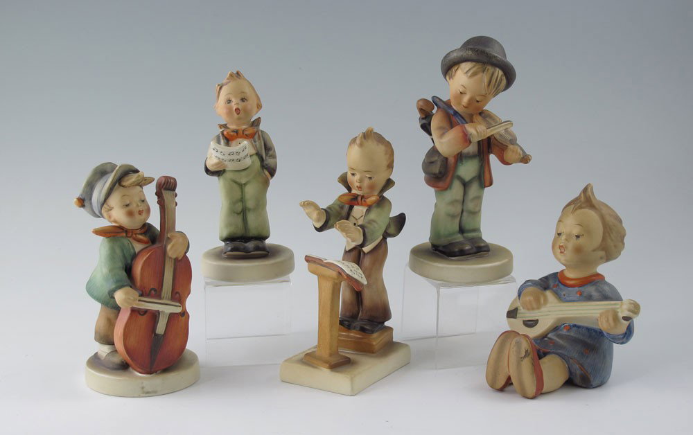 HUMMEL FIGURINES 5 FULL BEE MARKS: HUMMEL FIGURINES - 5 FULL BEE MARK: To include, JOYFUL #53, Germany, 4 1/2''h., slight crazing; BAND LEADER #129, Germany, 5 3/4''h.; Boy with Violin, impressed 4 to underside, Germany, 5 1/2'', sligh