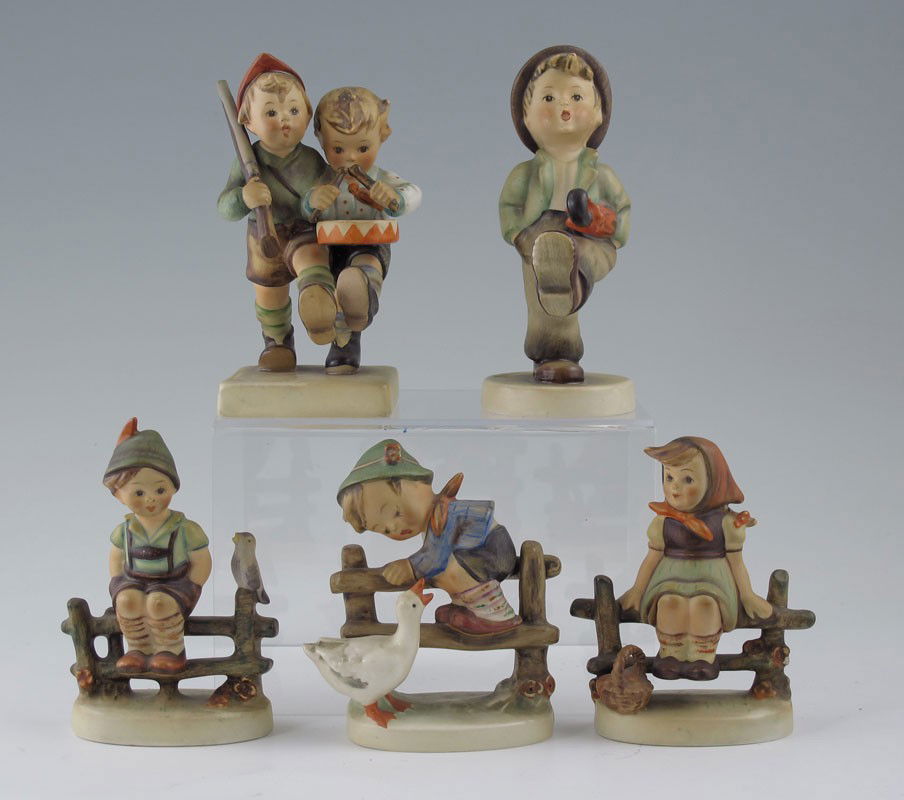 HUMMEL FIGURINES 4 FULL BEE 1 TMK 3: HUMMEL FIGURINES - 4 FULL BEE MARK 1 STYLIZED BEE: To include, VOLUNTEERS #50 2/0, Germany, 5''h., crazing and rough spot on back of drummer's shorts; HAPPY TRAVELER #109 /0, Germany, 5''h.; WAYSIDE H